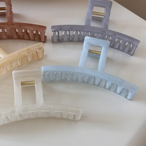 Selection of translucent jelly-style large shark hair clips in various pastel colors