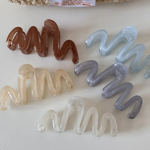 Five-piece wave-shaped large hair claw set in assorted translucent colors for women
