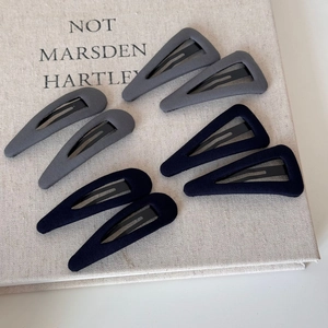 Eight-piece fabric covered geometric triangular hair clips in deep grey and navy blue
