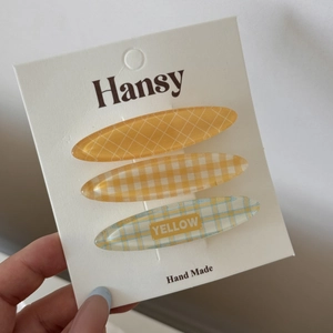 Lot de trois pinces à cheveux jelly colorées avec motifs à carreaux et rayures jaunes
