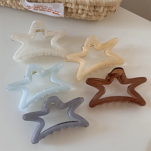 Lot de cinq pinces à cheveux translucides en forme d'étoile en diverses couleurs pastel