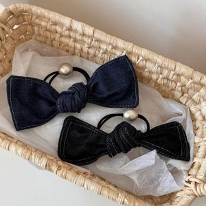 Denim bow scrunchies in navy and black with contrast stitching and silver bead detail