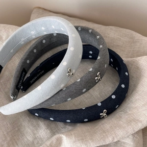 Set of blue and gray polka dot padded headbands with silver metal bow accents