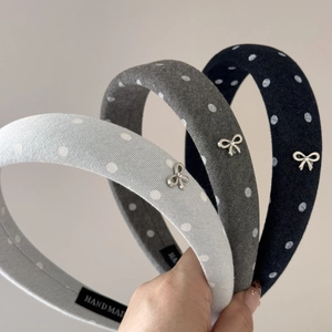 Padded polka dot sponge headband with silver bow detail in blue and grey colors