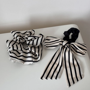 Striped scrunchie and long ribbon bow hair tie set in classic black and white minimalist style