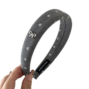 Chic grey polka dot padded headband with silver bow accent and thick sponge base