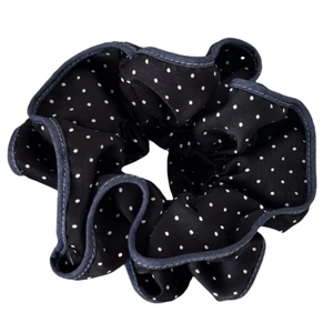 Black polka dot fabric scrunchie with denim-style edges for sweet hair styling
