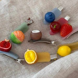 Cute fruit-shaped hair clips set including lemon and strawberry for sweet styling