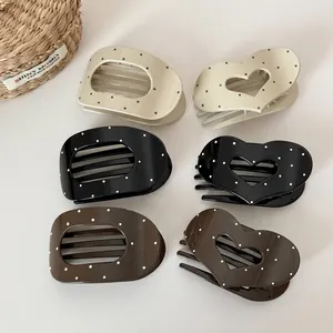 Retro polka dot heart and oval hair claw clips set in cream black and brown colors