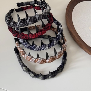Five assorted plaid fabric headbands with long teeth for voluminous hair styling