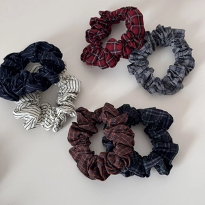 Set of six classic plaid and striped scrunchies in varied colors for hair styling
