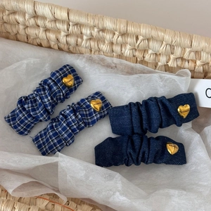 Blue plaid fabric hair clip set with pleated design and gold heart buckle details