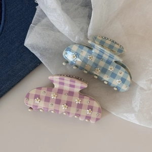 Pinze per capelli a scacchi e fiori in blu e viola con strass per uno styling elegante