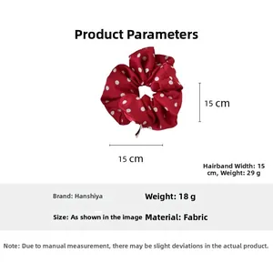 Polka dot satin scrunchie detail showing 15cm dimensions and high-quality fabric texture