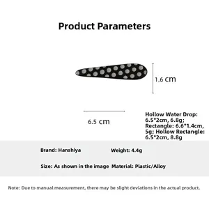 Detailed view of polka dot drop hair clip showing dimensions 6.5cm x 1.6cm and materials