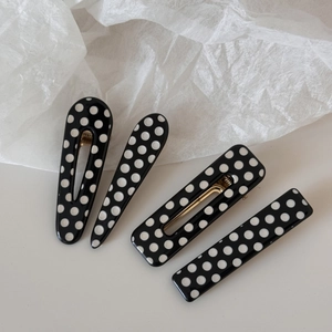 Minimalist black and white polka dot resin hair clip set for women with glossy finish