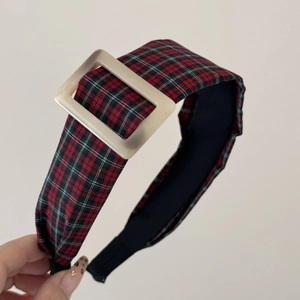 Detail of vintage plaid headband featuring a stylish white square resin buckle accent
