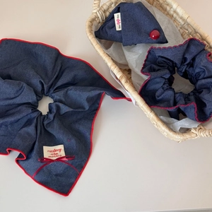 Navy denim scrunchie set with red lace edges and ribbon for casual hair styling