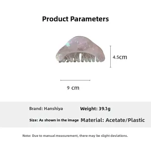 Detail view of 9cm x 4.5cm acetate shark hair clip with precise size and weight annotations