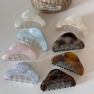 Eight colors of acetate shark hair clips with pearl and marble texture in high detail