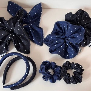 Detailed set of denim hair accessories with white heart patterns and woven labels