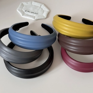 Wide padded PU leather headbands in multiple colors with elegant litchi texture