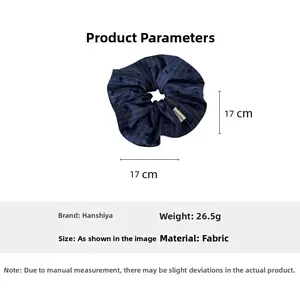 Detail of blue striped oversized scrunchie with cat print measuring 17cm by 17cm