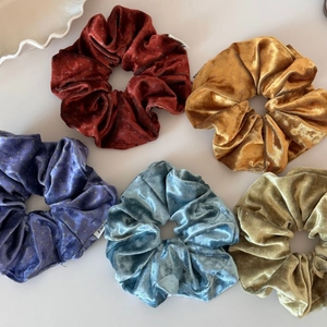 Five-pack of velvet polka dot scrunchies in assorted vintage colors for women