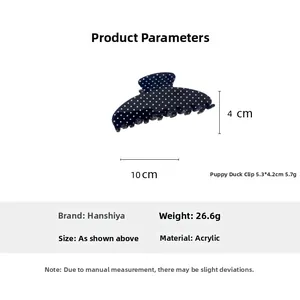 Detail view of navy blue polka dot hair claw clip showing 10cm length and 4cm height