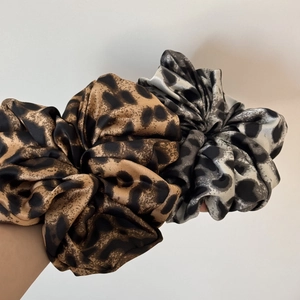Set of two leopard print oversized satin scrunchies in brown and grey tones