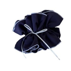 Navy blue vintage plaid oversized scrunchie with light blue hem and elegant ribbon bow