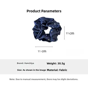 Detail view of denim blue heart print scrunchie with 11cm diameter measurement