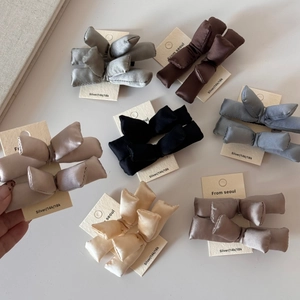 Chic padded cotton bow hair clips in multiple satin colors for a minimalist Korean style