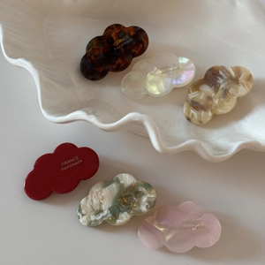 Cloud-shaped acetate mini hair clips in six colors and marbled patterns for women