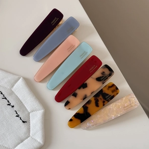 Set of 8 colorful handmade acetate hair clips with golden metal base and elegant lettering
