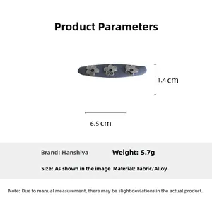 Detail showing dimensions 6.5cm length and 5.7g weight of floral denim fabric hair clip