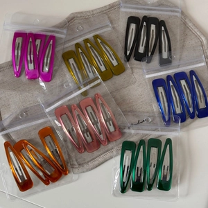 Set of colorful vintage triangle BB hair clips for women in seven vibrant glossy shades