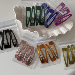 Set of minimalist colorful triangular BB hair clips in vibrant vintage matte finish