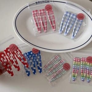 Three-piece set of printed teardrop BB hair clips featuring plaid and polka dot patterns