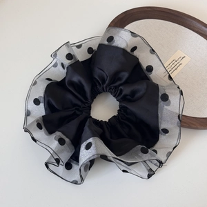 Detail showing layers of black satin and silver polka dot mesh ruffles on large scrunchie