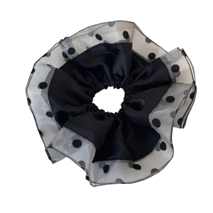 Large black satin scrunchie with polka dot mesh trim and layered tulle ruffles for ponytail