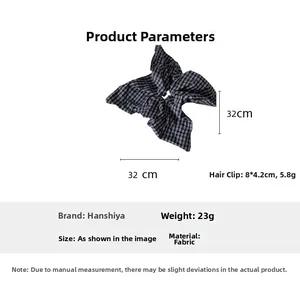 Detail view showing dimensions of navy plaid fabric hair scrunchie and matching clip set