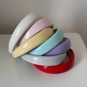 Colorful padded patent leather headband set in vibrant candy colors for women