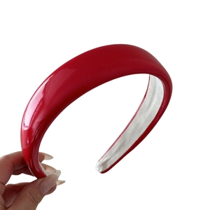 Glossy red sponge padded headband with wide design and premium high-shine finish