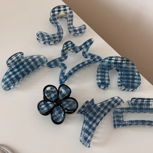 Blue and white checkered pattern hair claw clips set in various geometric shapes