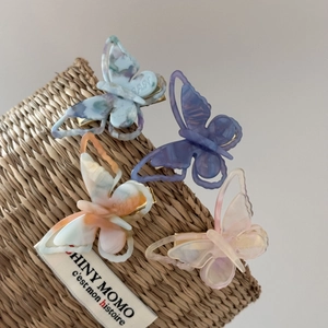 Chic butterfly acetate hair clips set in colorful marble and translucent resin styles