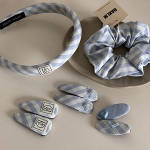 Detailed set of blue and white plaid fabric hair accessories with cute puppy patches