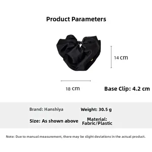 Detailed dimensions of a black satin fabric hair claw clip with its width and height measurements