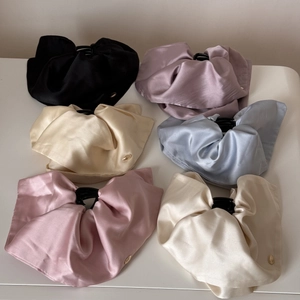 Elegant satin silk hair claw clips in various colors with metallic decorative detail