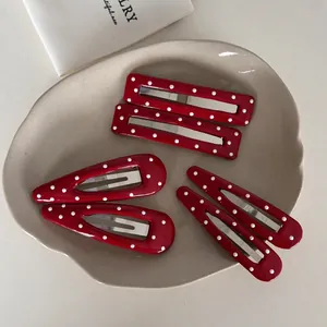 6-piece red and white polka dot hair clip set with rectangle and teardrop shapes